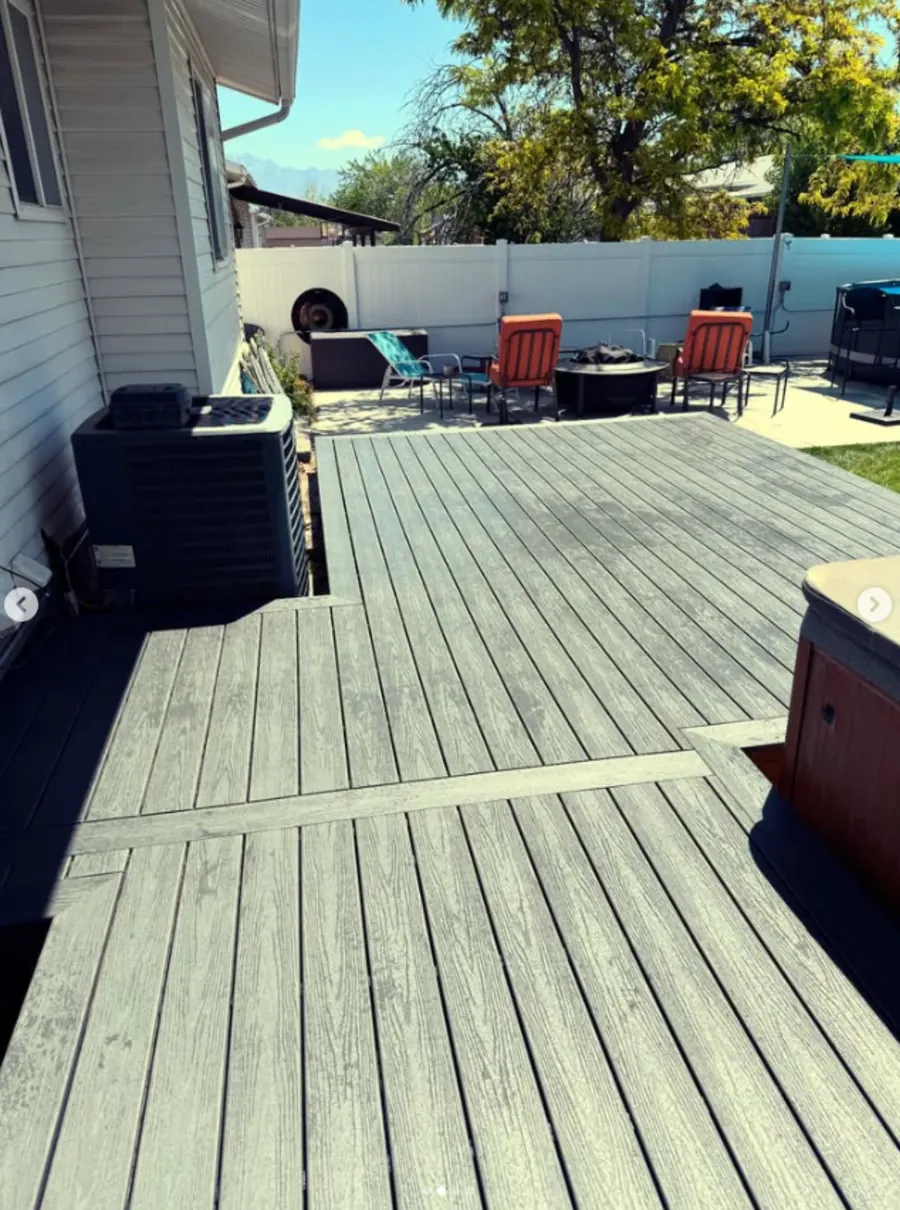 Custom backyard deck by Frame Platinum LLC