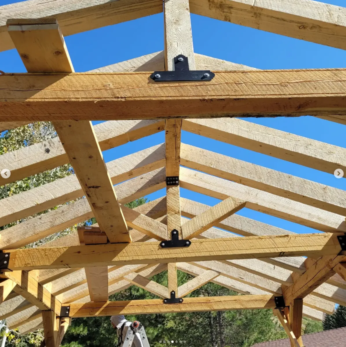 Interior view looking up through framed rafters by Frame Platinum LLC
