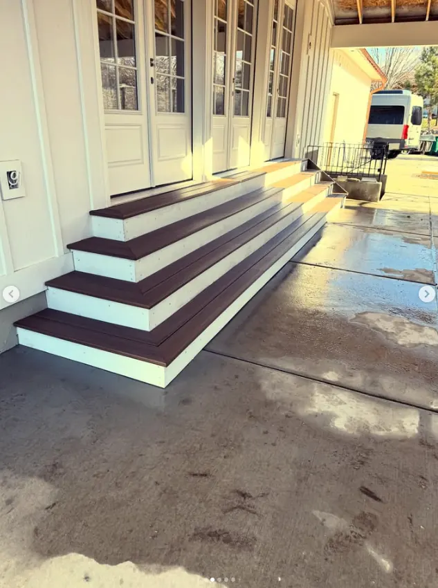 Front steps outside French doors by Frame Platinum LLC