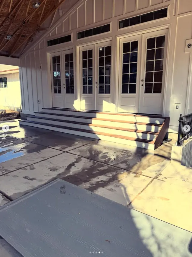 Front steps under a covered patio by Frame Platinum LLC