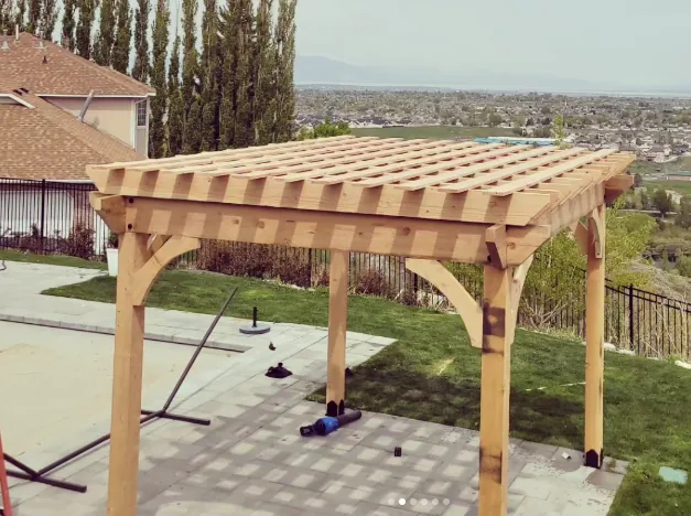 Pergola viewed from above with open beam roof by Frame Platinum LLC